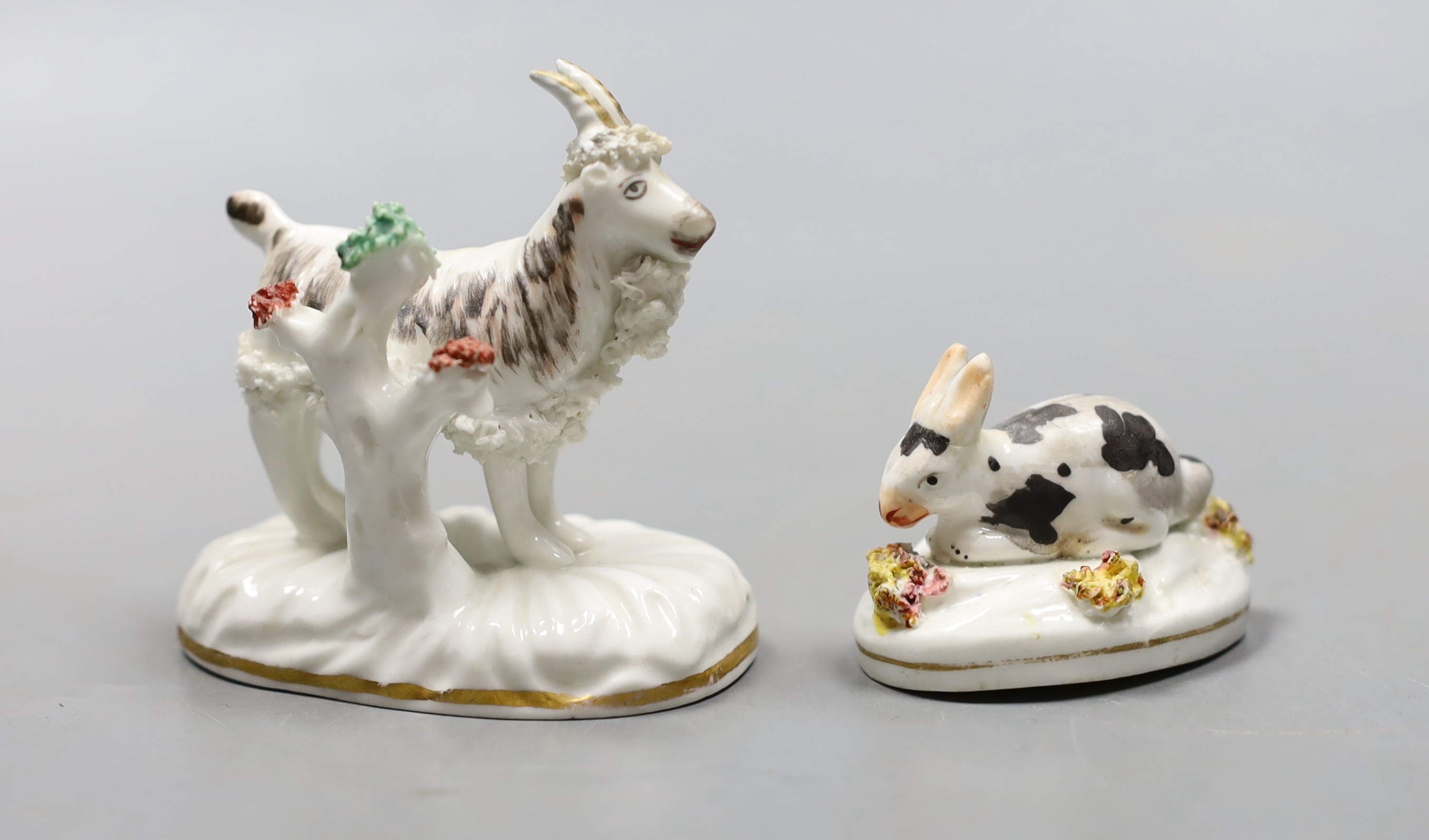 A Staffordshire porcelain model of a Billy goat, 7 cm long and a similar model of a recumbent rabbit, c.1830–50 (2), Provenance- Dennis G Rice collection